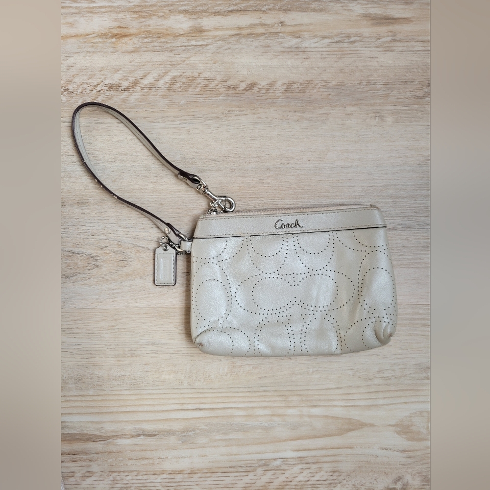 SOLD Coach Beige Wristlet Bag Perforated C